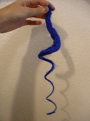 Image: A completed curly dread