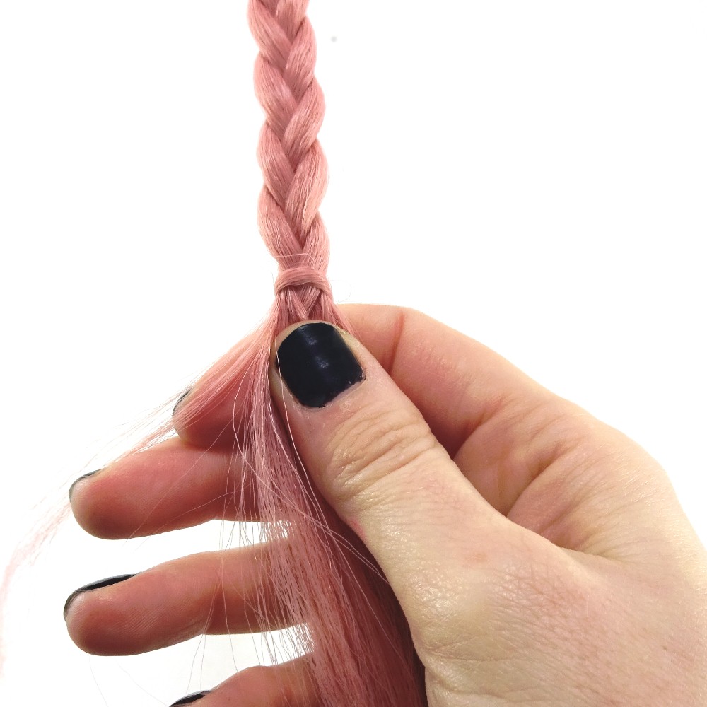 Step 5: Pull another strand from the opposite side of the braid and repeat Steps 2-4.